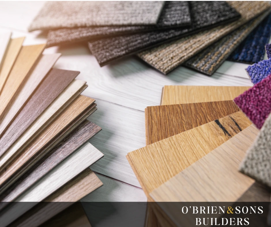 "Various flooring samples including hardwood, laminate, tile, and carpet being reviewed and compared for installation, showcasing material options and surface textures used in residential construction."