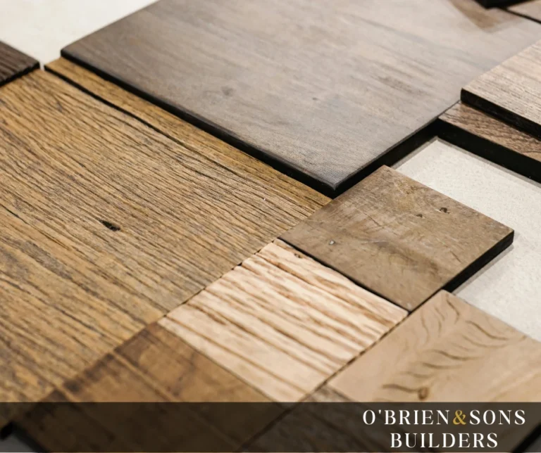 "Different shades and textures of wood flooring placed together, showcasing key characteristics of durable flooring materials."