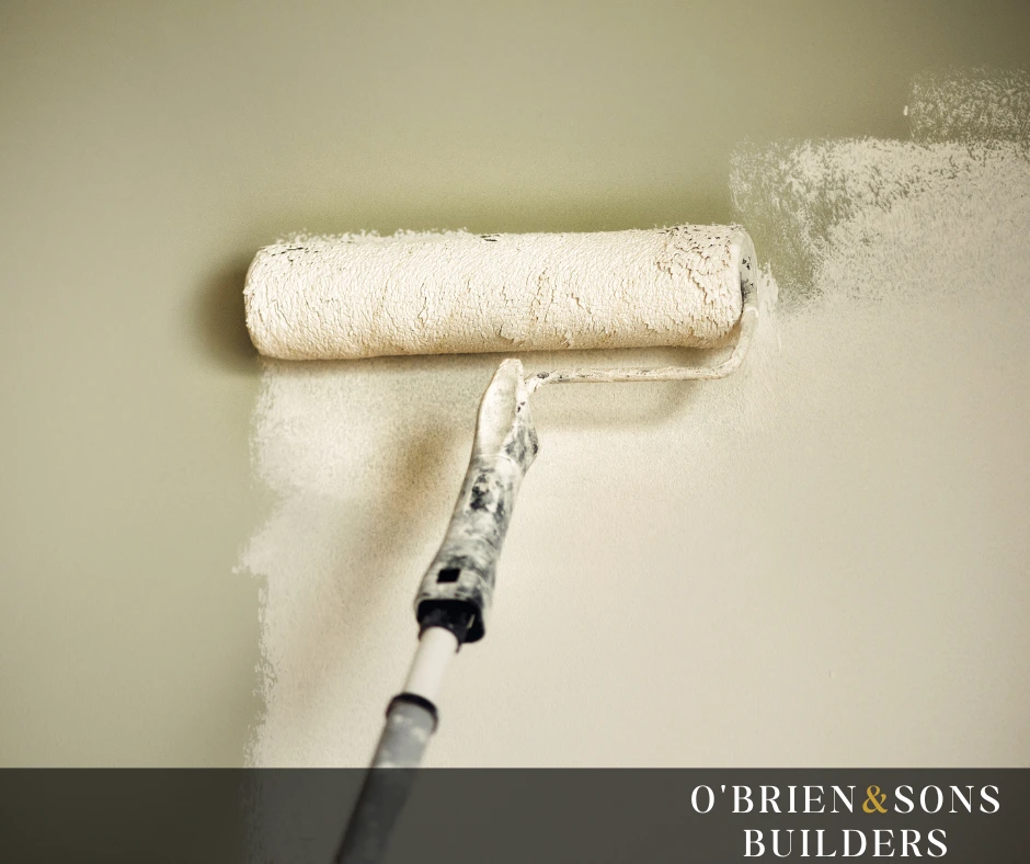 Applying a weather-resistant sealant with a roller during an exterior painting project to ensure long-lasting protection against the elements in Tarzana, CA.